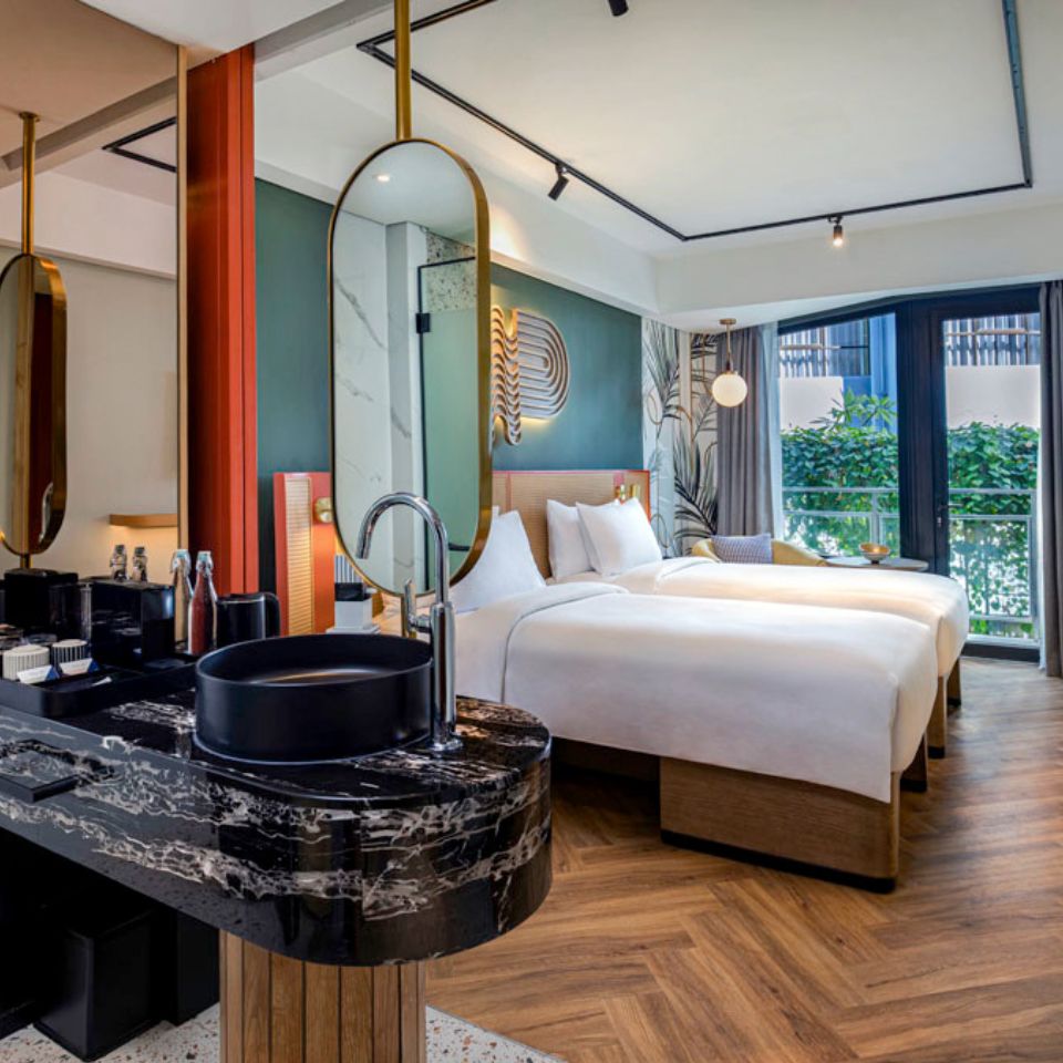 Comfort Twin Guest Room at TRIBE Bali Kuta Beach