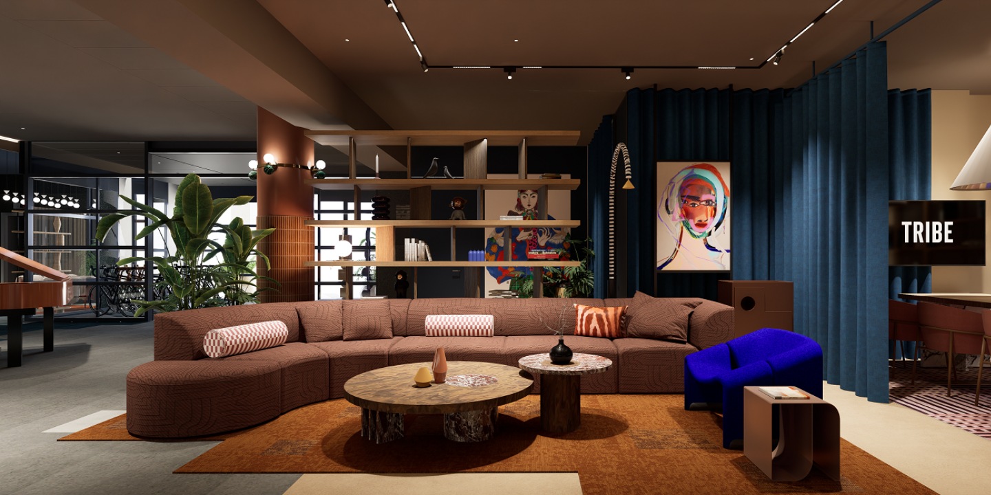 A modern hotel lobby with a large brown couch, art and shelves with decor in it.