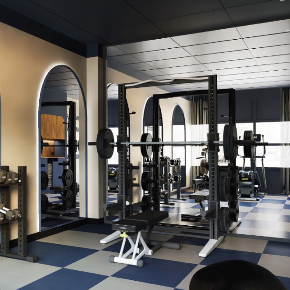 A hotel gym with weight-lifting equipment.