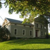 Farmhouse with Farmhouse Suite on right side with private entrance and backyard