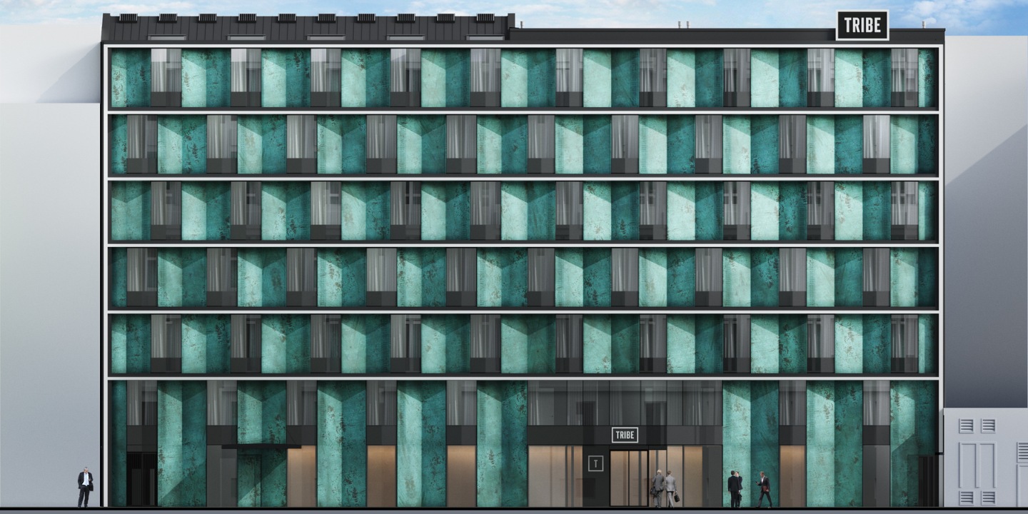 Modern hotel facade featuring geometric turquoise panels, large windows, and the TRIBE sign, under a clear blue sky.
