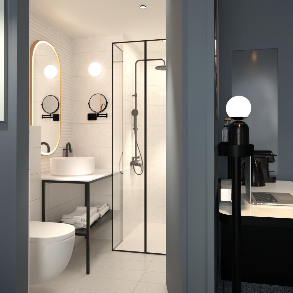 Modern bathroom featuring a glass shower, circular mirrors, minimalist sink, and stylish lighting. Clean, sleek design elements throughout.