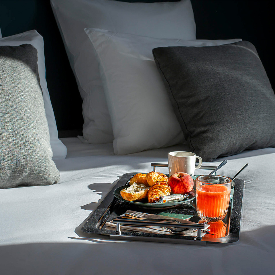 Comfort Double Room - Fresh breakfast foods on tray laying on a double bed