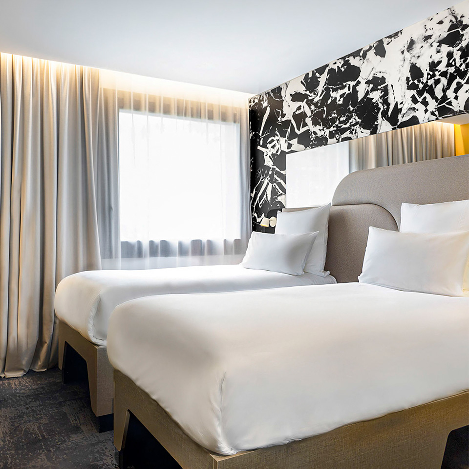 Two single beds in spacious hotel room