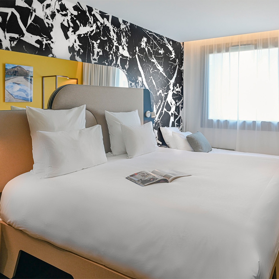 Double bed next to single sofa bed