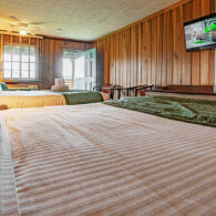 Lodge rooms on the mountainside above the Main Lodge with Farm Restaurant.