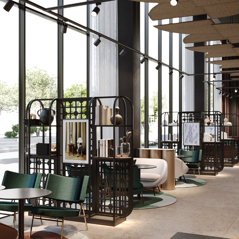 Hotel lobby featuring sleek furniture, decorative partition shelves, and large windows with greenery outside.