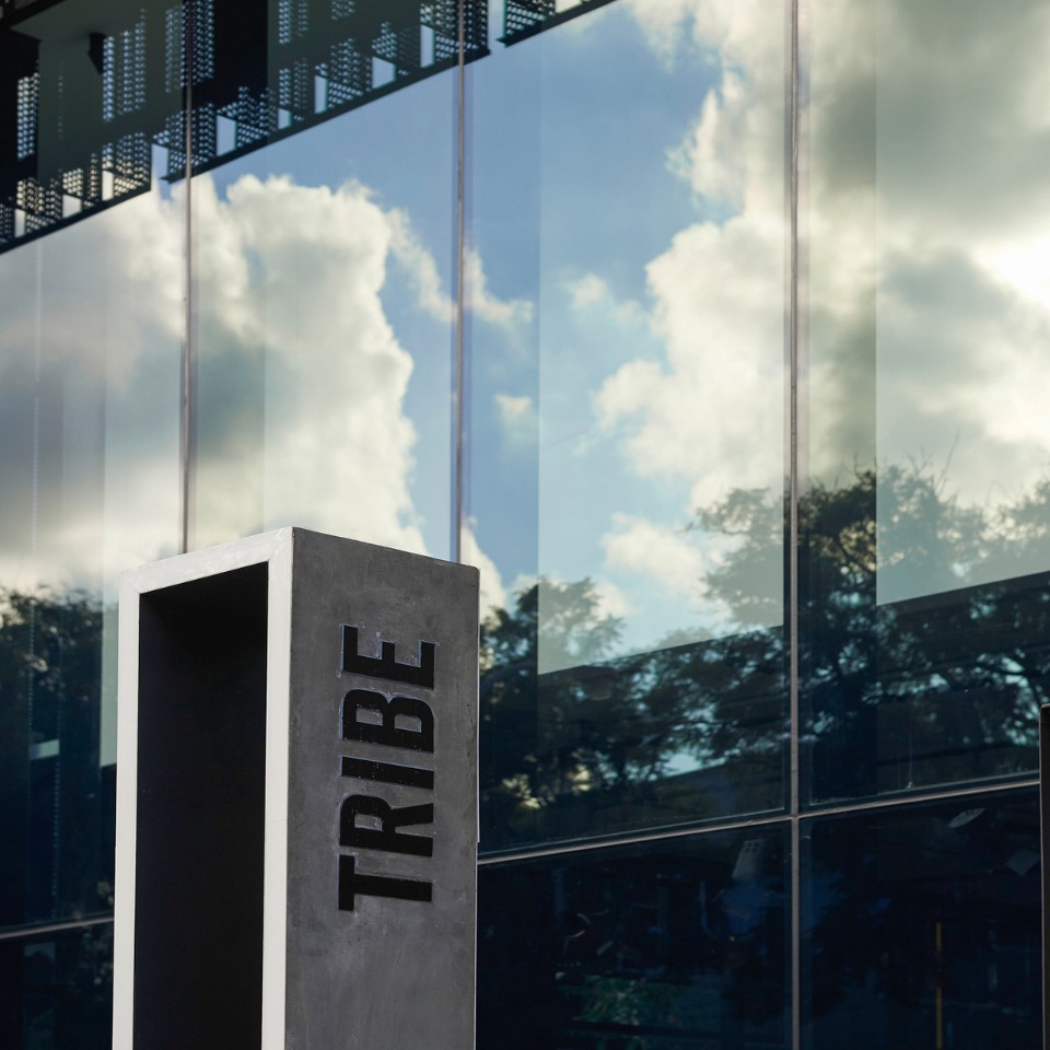the exterior of TRIBE Perth with the TRIBE logo in front of it