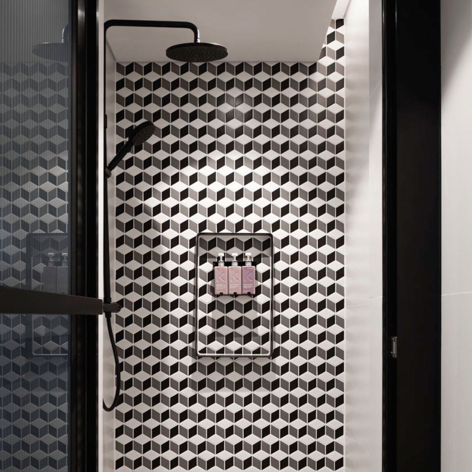 A rainshower with wall-mounted products by Kevin Murphy.