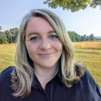 Cathy Barnes standing in a field